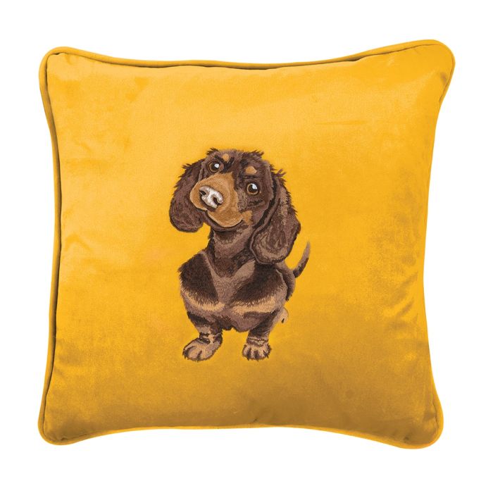 Embroidered dachshund cushion on yellow fabric