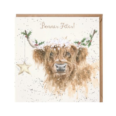 Highland cow with holly on antlers French Christmas card
