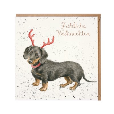 Dachshund wearing red antlers German Christmas Card