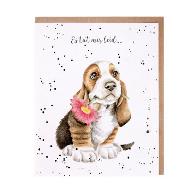 Bassett Hound puppy with a flower in its mouth German card