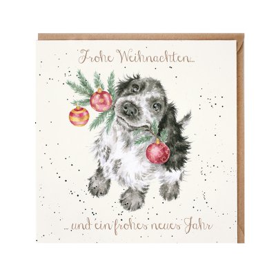 Spaniel with a Christmas tree branch in its mouth German Christmas Card
