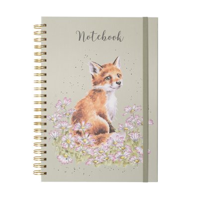 A young fluffy fox exploring a field of daisies on an A4 spiral bound notebook