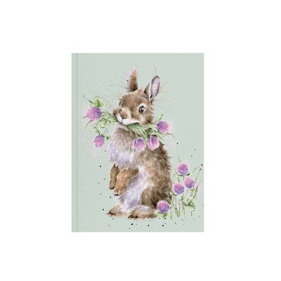 Rabbit eating clovers illustration on A6 paperback notebook 