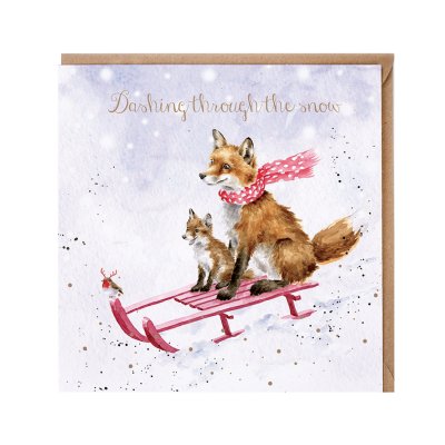 A fox and fox cub on a sledge Christmas card